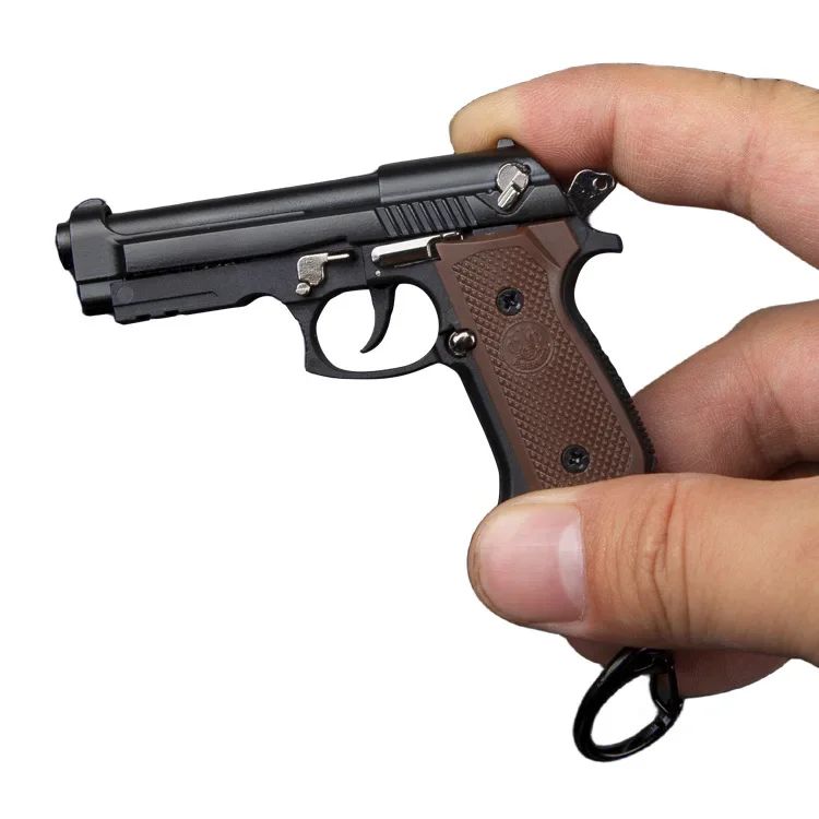 ใหม่1: 3.ของเล่นจี้ห้อยพวงกุญแจรูปปืน M92F อัลลอยด์ขว้างเปลือกหอยไม่สามารถยิงได้