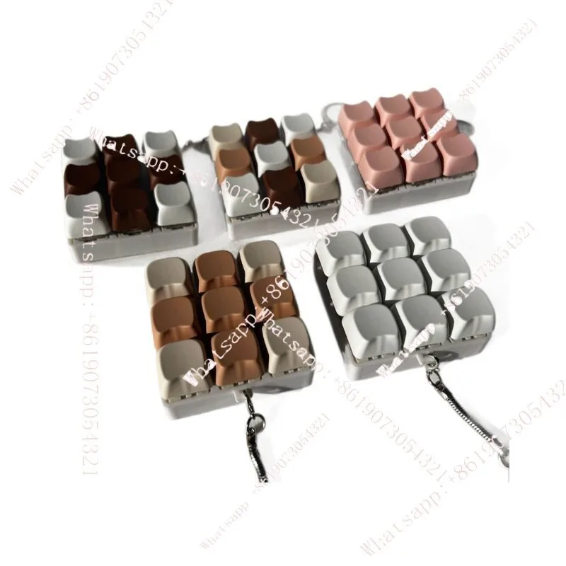 

Популярный брелок-подвеска в виде тестера переключателей для механической клавиатуры с девятью клавишами в стиле кошачьей лапки