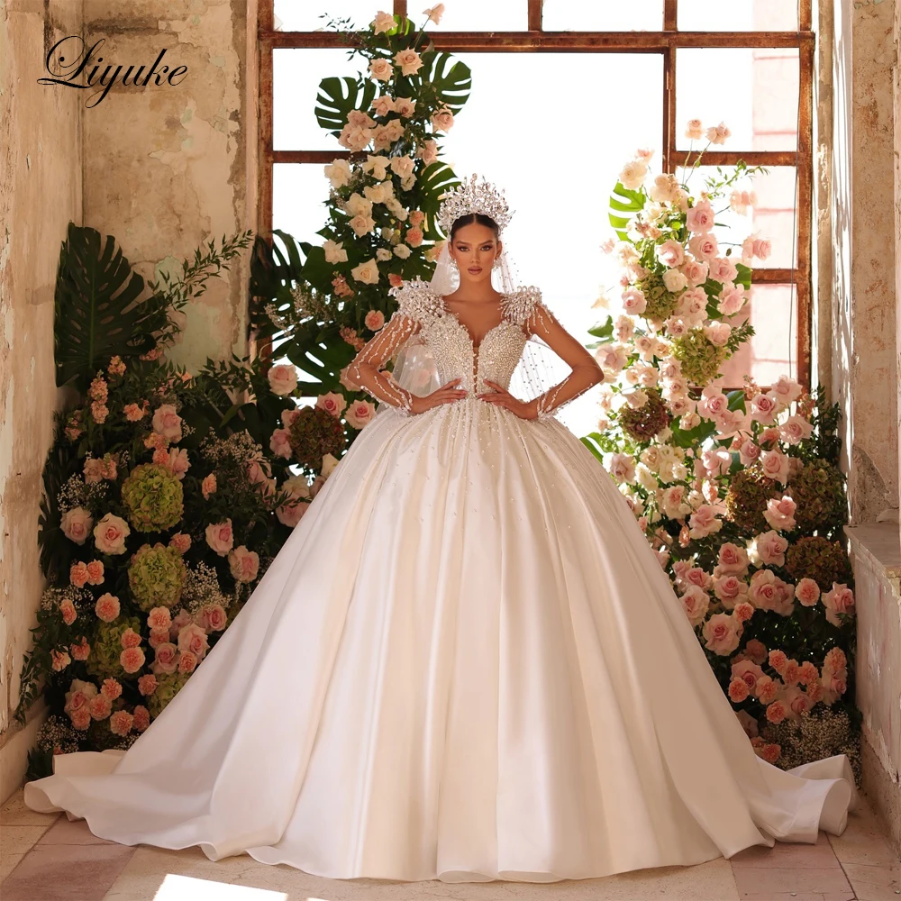 

Liyuke Custom Made Vintage Satin Full Of Beaded Pearls Ball Gown Wedding Dresses V-Neck Puffy Bridal Gowns