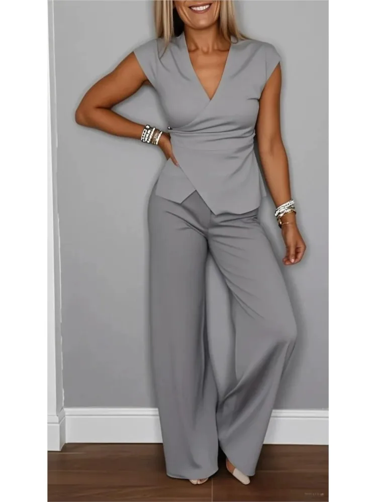 Casual mouwloze V-hals halslijn geplooide knop mouwloze top 2-delige set elegante dames kantoor wijde pijpen lange broek tweedelige set