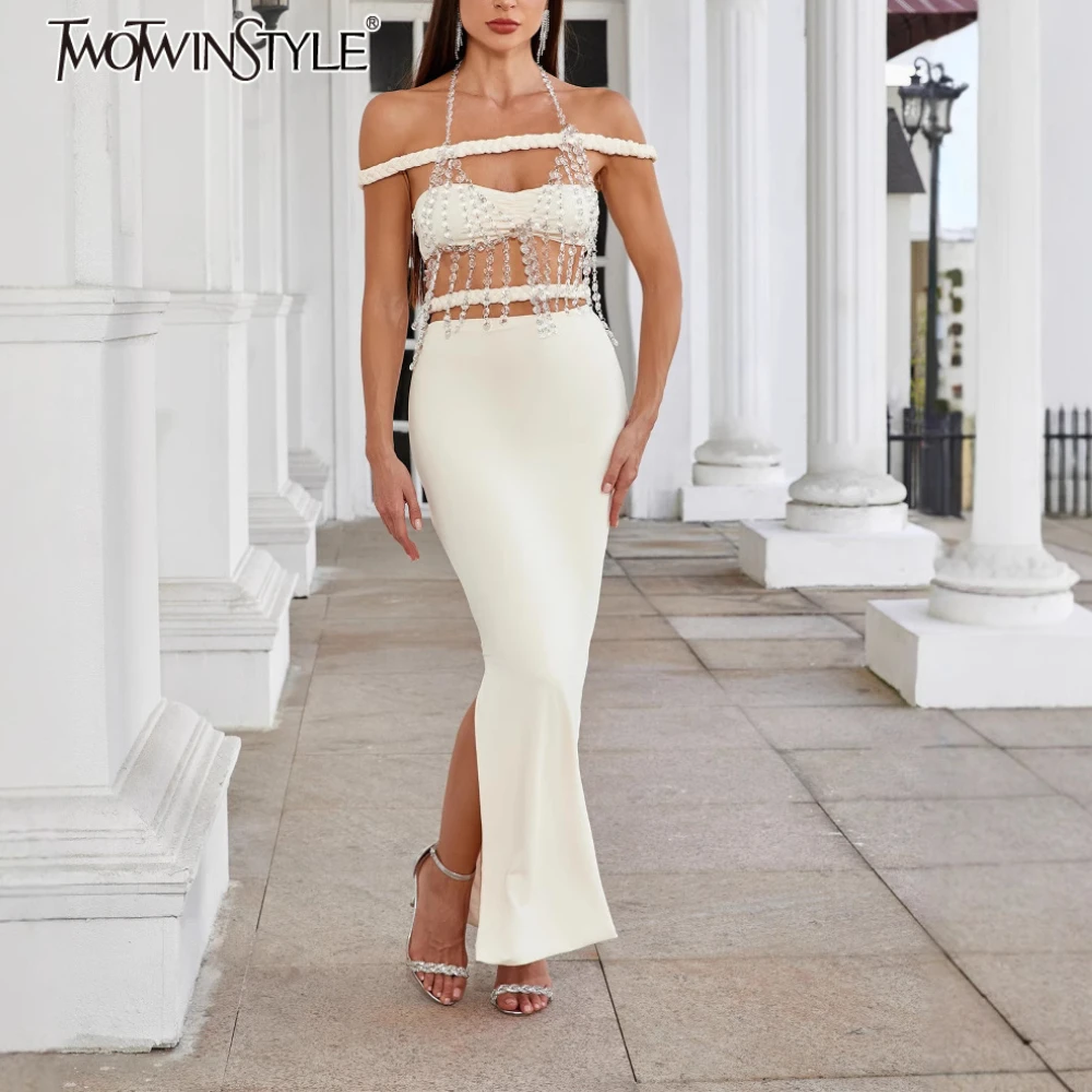 

TWOTWINSTYLE Solid Two Piece Set for Women Halter Neck Sleeveless Spliced Hollow Out Sexy Top High Waist Slim Skirt Sets Female