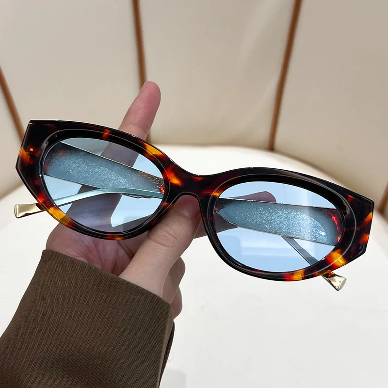 Personalized cat-eye sunglasses European and American FashionPCMetal-leg sunglasses with a marble-like design, for women