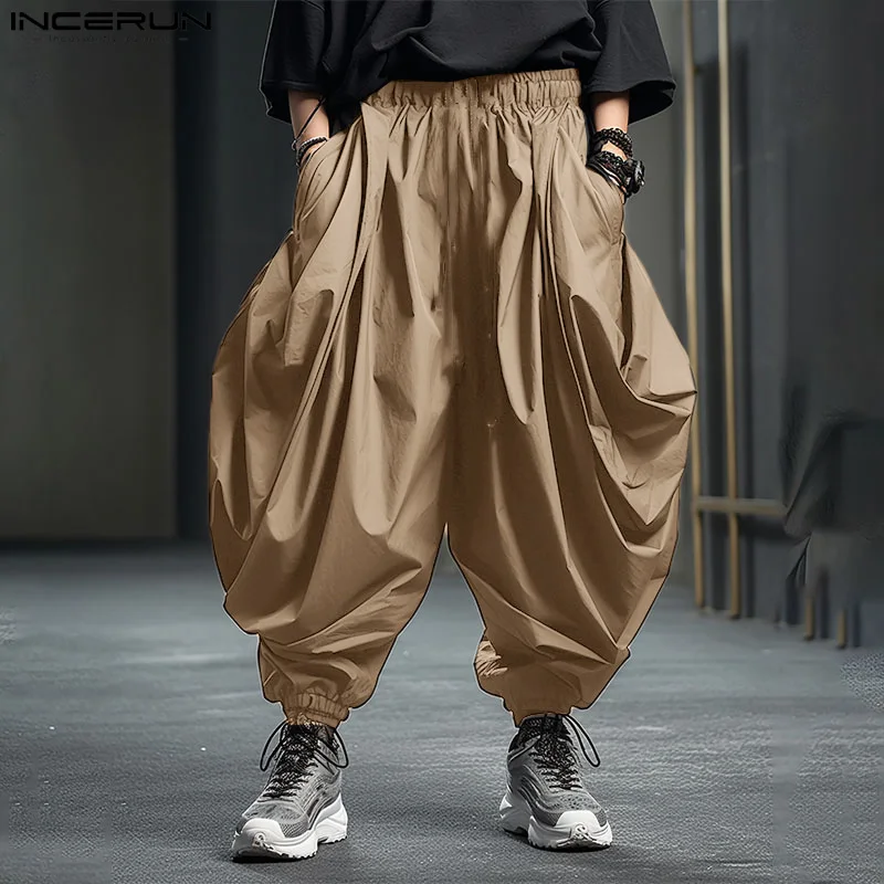 INCERUN Men Irregular Pants Solid Color Elastic Waist Joggers Loose Trousers Men Streetwear 2024 Drop-crotch Casual Harem Pants