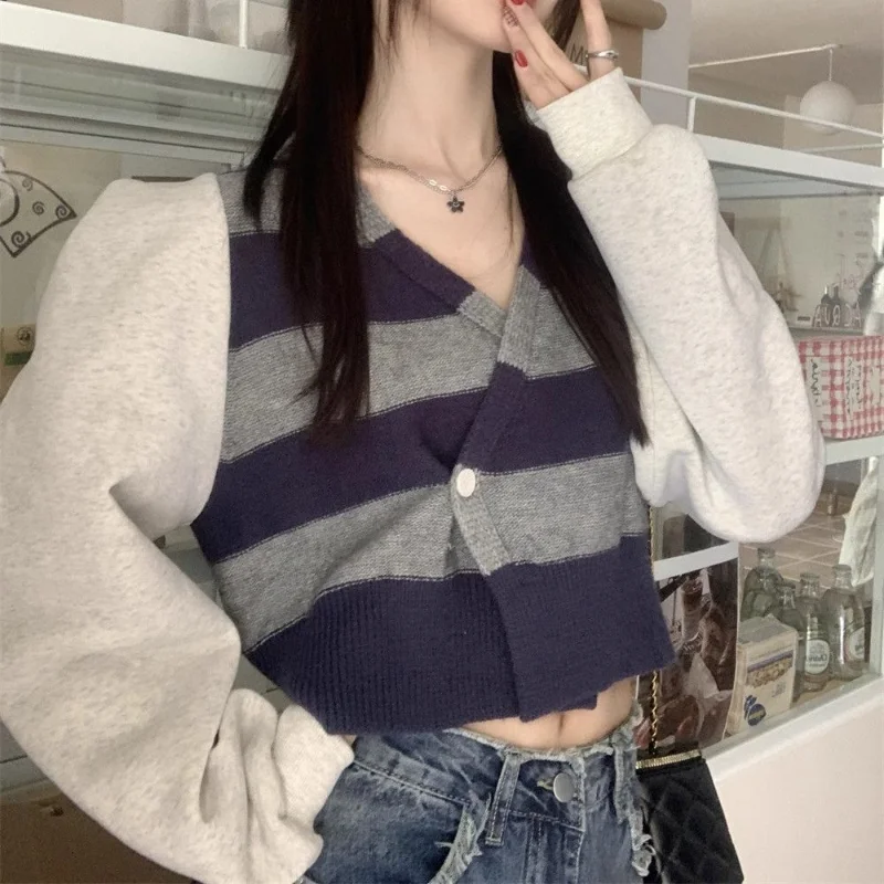 Pull en tricot rayé à manches bouffantes de style coréen avec un design asymétrique