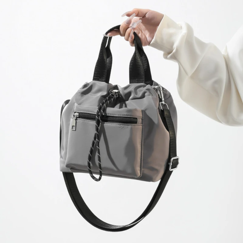 

2024 New Hot Selling Solid Drawstring Bucket Bag Fashionable and Versatile Large Capacity Multi Functional Shoulder Bag