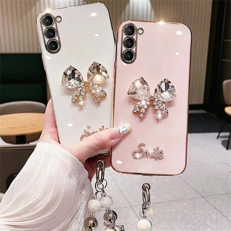 

Luxury Plating Diamond Bow Wrist Chain Phone Cover, Rhinestone Case for iPhone16 15Pro, 14Plus, 13 Pro, 16, 16Pro MAX, 15PLUS