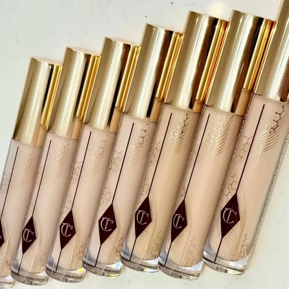 Charlotte Tilbury Softening Essence Concealer Honey Iluminador para el rostro que cubre las manchas y las ojeras debajo de los ojos