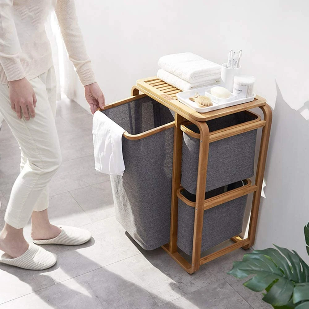 I controsoffitti cavi a tre divisori faciliscono la classificazione del drenaggio e conservare i cestini per vestiti sporchi