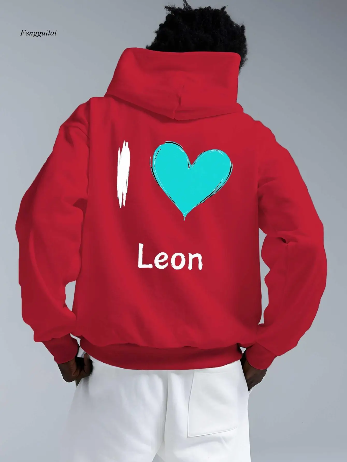 Czerwona bluza z kapturem z nadrukiem serca i napisem "I Love Leon", turkusowa - luźna bluza oversize z kieszenią z tyłu.