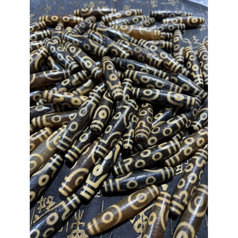 

Seven-Eye Tibetan Style Factory Wholesale High-Oil Coated Pulp Weathering Delicate 60mm Old Teeth Yellow Tibet Beads