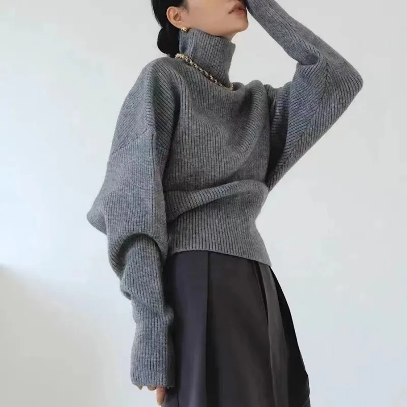 

French-style high-neck slim-fit sweater for women, autumn and winter thickened, chic and unique batwing knit top