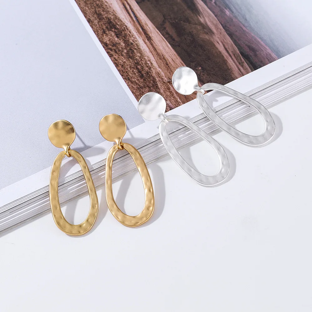 

DIY accessories exclusive retro bohemian women's versatile earrings geometric Hong Kong style medium and long percussion surface