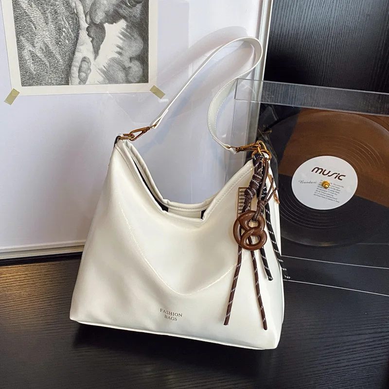 

Винтажная женская сумка большой вместимости, новая модная и стильная сумка через плечо, сумки-тоут на одно плечо с простой текстурой