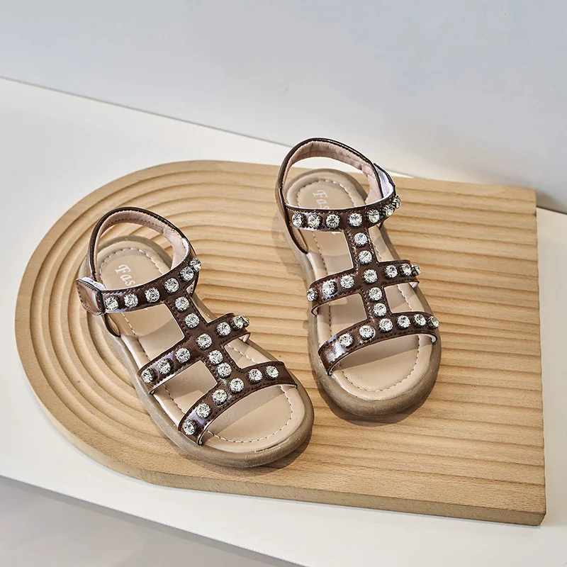 Kinderen Retro Romeinse Sandalen 2024 Gloednieuwe Koreaanse Comfortabele Zachte Zool Meisjes 'Mode Strass Strandschoenen Kinderen Zomer Flats