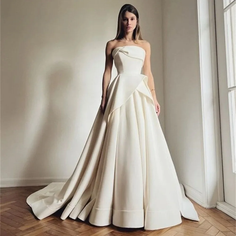 Customized Simple Strapless A-line Strapless Wedding Dresses 2026 Sleeveless Large Swing Satin Bridal Gown Irregular Folding