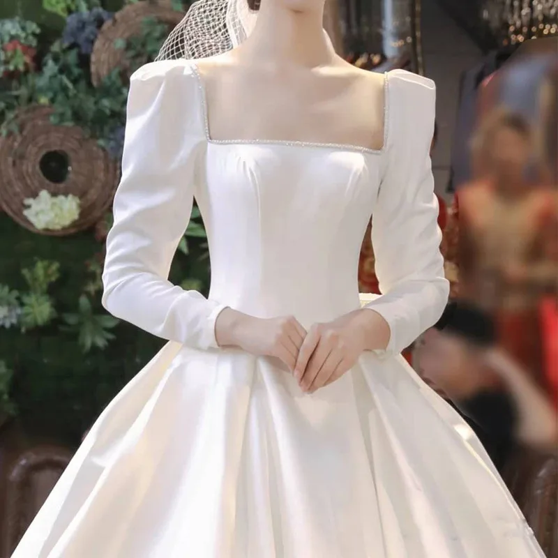 2024 new bridal long-sleeved arm covering super fairy temperament wind out light yarn big trailing satin main wedding dress