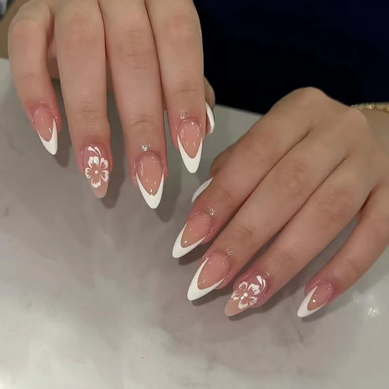 

Nude Color Press on Nails Almond White French Style Fake Nails Sweet Flower Designs Simple Charms Nails Art for Women Girls