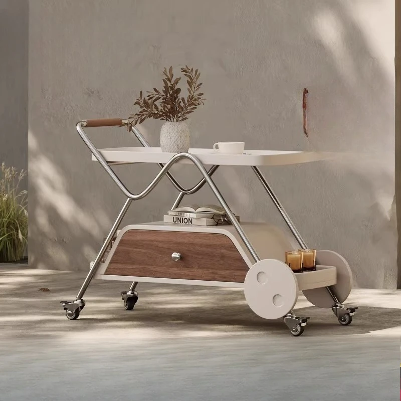 

A few storage on the side of the trolley, a few mobile shelves in the living room