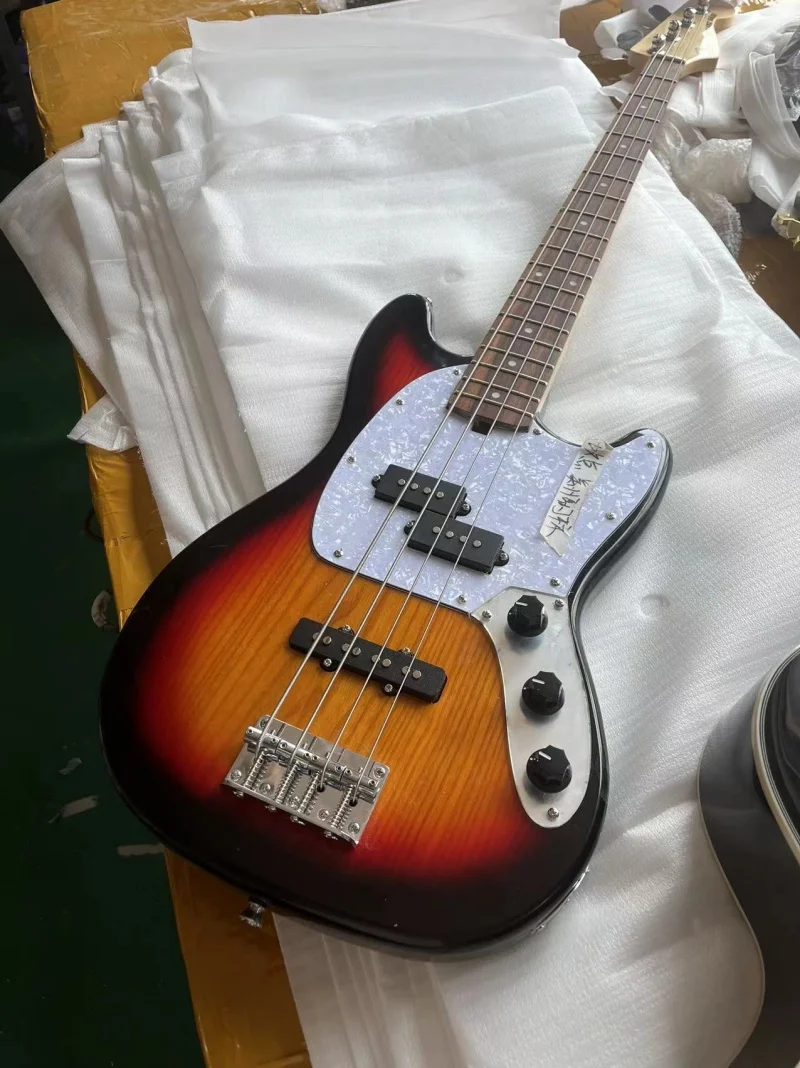 The factory makes 4-string special-shaped electric bass，Maple neck, rosewood fingerboard，Silver hardware，free delivery
