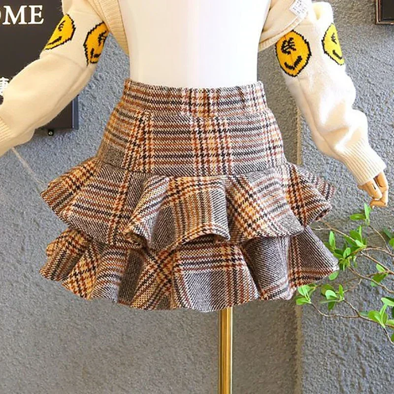 

Kids Girls Plaid Cake Skirts 2024 New Arrival Children Casual Woolen Pleated Skirt Autumn Winter Cotton Clothes Korean Style