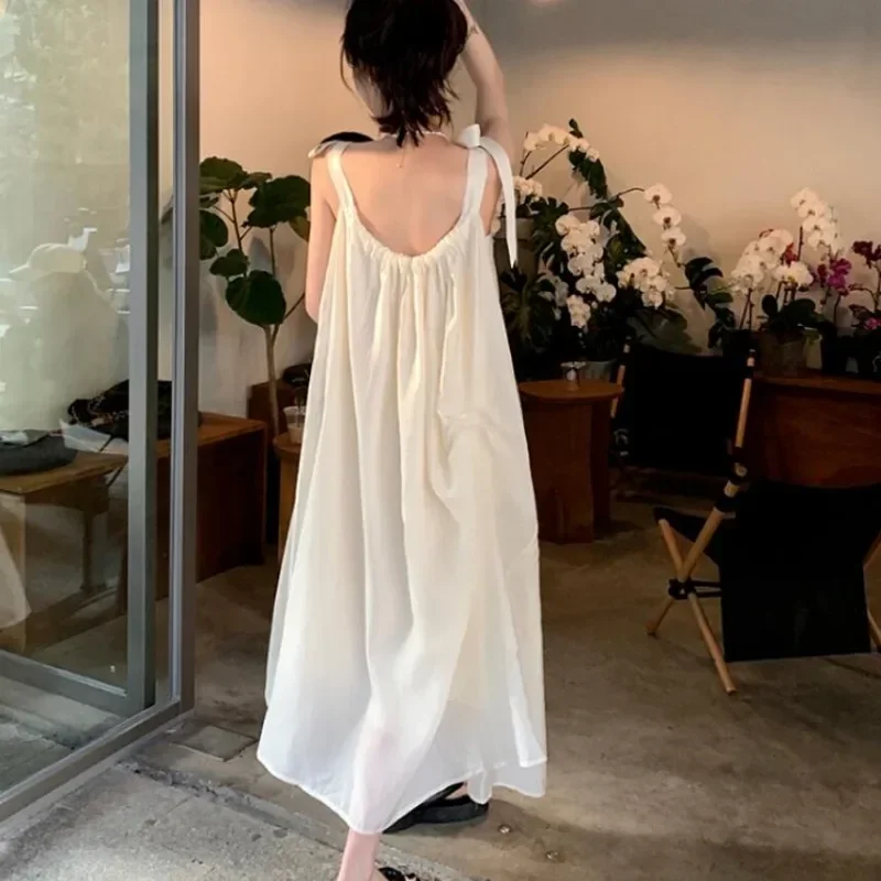 French Style Lace-up Gentle Slip Dresses Women\'s Summer New Open-back Dress Seaside Resort Beach Skirt Niche Loose Long Skirt