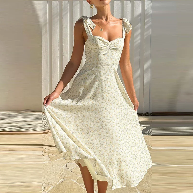 เดรสยาวพิมพ์ลายดอกไม้แฟชั่น เอวสูง สไตล์ลำลองสำหรับผู้หญิง เปิดไหล่ จับจีบ เหมาะสำหรับใส่ไปเที่ยวทะเล เซ็กซี่ แขนกุด สายเดี่ยว สำหรับวันหยุด