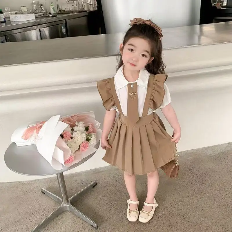 

Kids Girls' Summer Dress Set 2026 New Children's College Style Flying Sleeve Shirt+Strap Skirt Two-piece Set 2- 7 Years