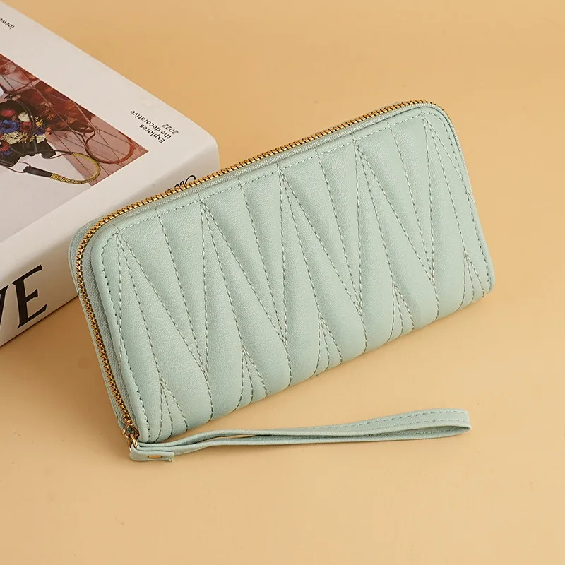 Nueva cartera de almacenamiento para mujer de gran capacidad con aroma pequeño, cartera ligera europea y americana de lujo con cremallera a mano