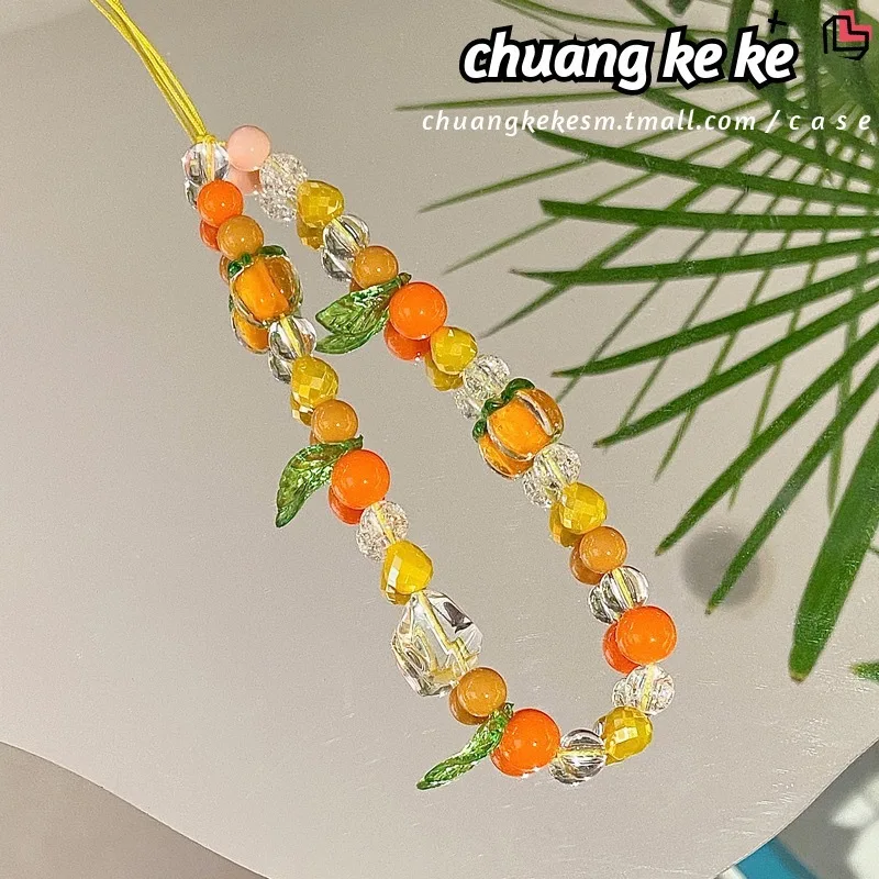 

Key Mobile phone lanyard Wrist rope Big orange bag pendant Hand woven lanyard Persimmon Ruyi