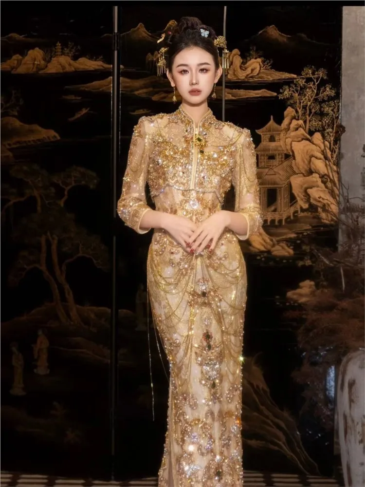 

Heavy Industry's new champagne-colored fishtail dress wedding toasting gown and