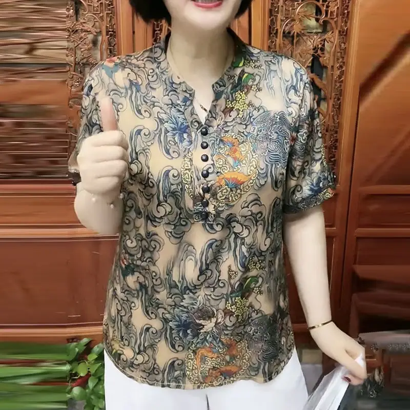 

Stylish Printed Summer Short Sleeve Blouse Female Clothing Vintage Printed Casual V-Neck Button Commute Spliced Straight Shirt