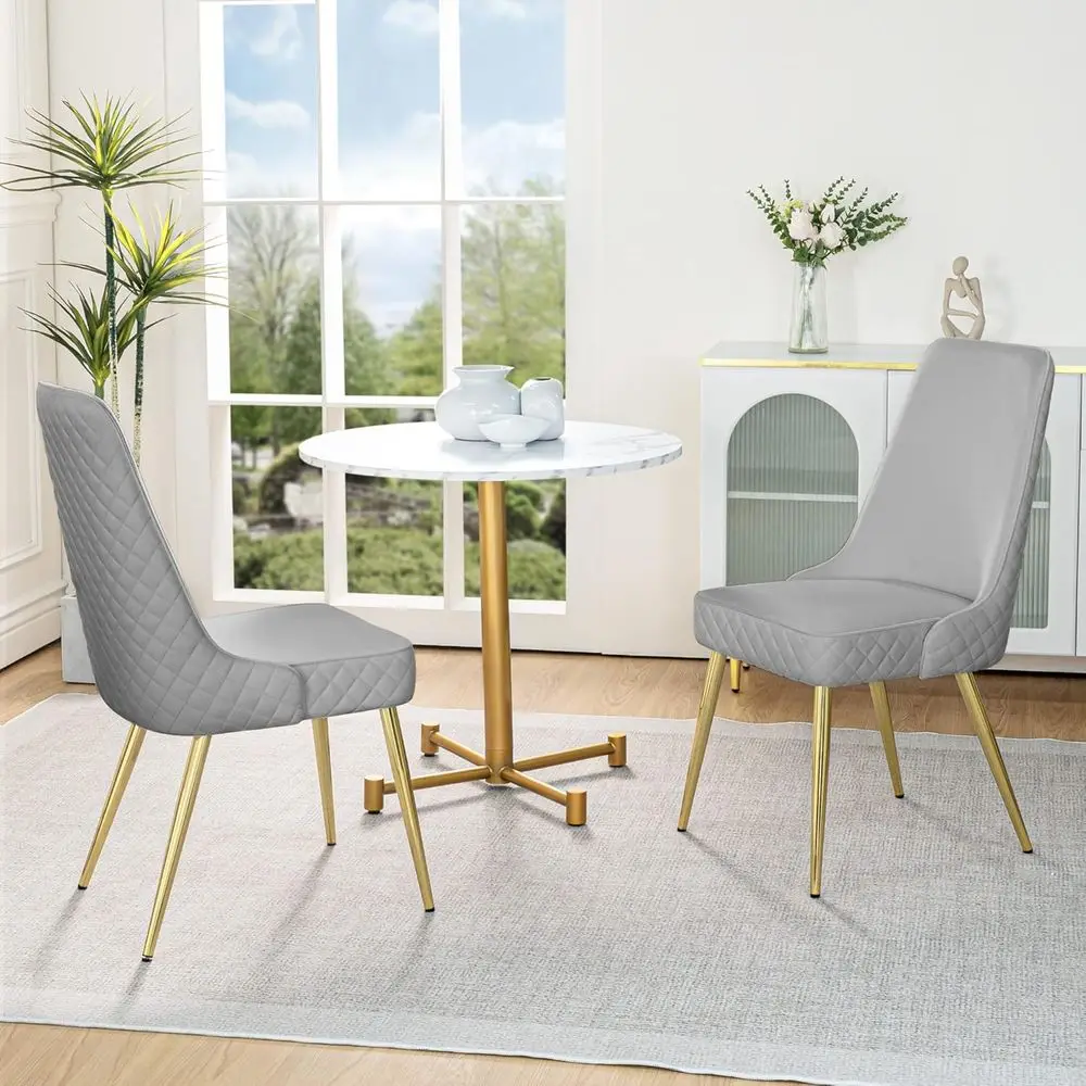 

Pair of Modern Grey Fabric Upholstered Dining Chairs with Padded Seats and Gold Legs for Home or Commercial Use