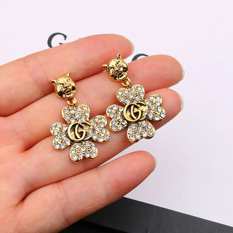 أقراط نسائية فاخرة على شكل زهرة برونزية عتيقة 2025 أقراط رأس GG جديدة مجوهرات نسائية هدية للحفلات