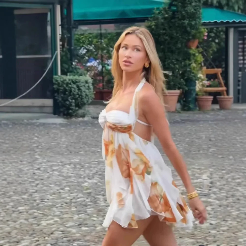 Nuevo Vestido corto de verano europeo y americano con cuello halter y falda irregular para mujer