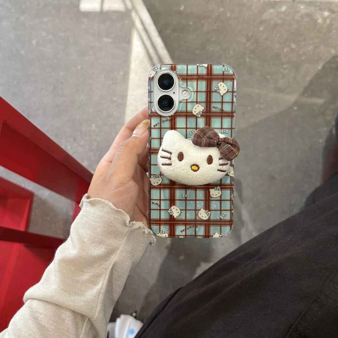 3D Hello Kitty KT cabeza de felpa flor agarre Tok titular funda de teléfono para iPhone 17 16 15 14 13 Pro Max moda patrón de rejilla marrón azul