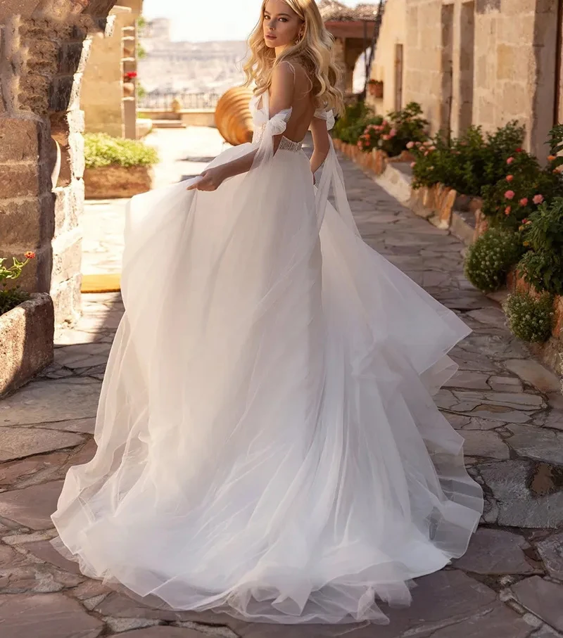 Eleganti abiti da sposa graziosi nuovo 2023 lusso scintillante perline Sexy scollo a v profondo Appliques corte treno principessa abito da sposa