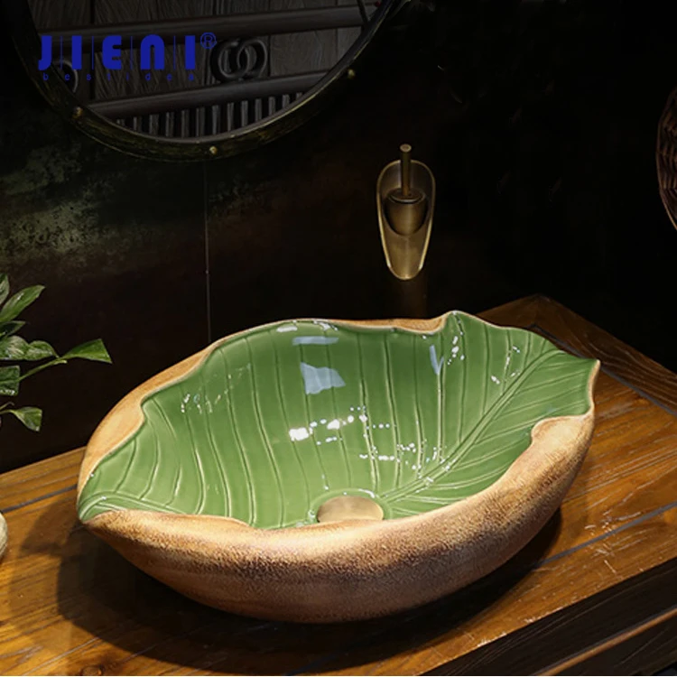 

JIENI Art Ceramic Bathroom Sink Set Leaf Style Washbasin W/ Waterfall Antique Brass Faucet Pop Up Drain High End Porcelain Sinks
