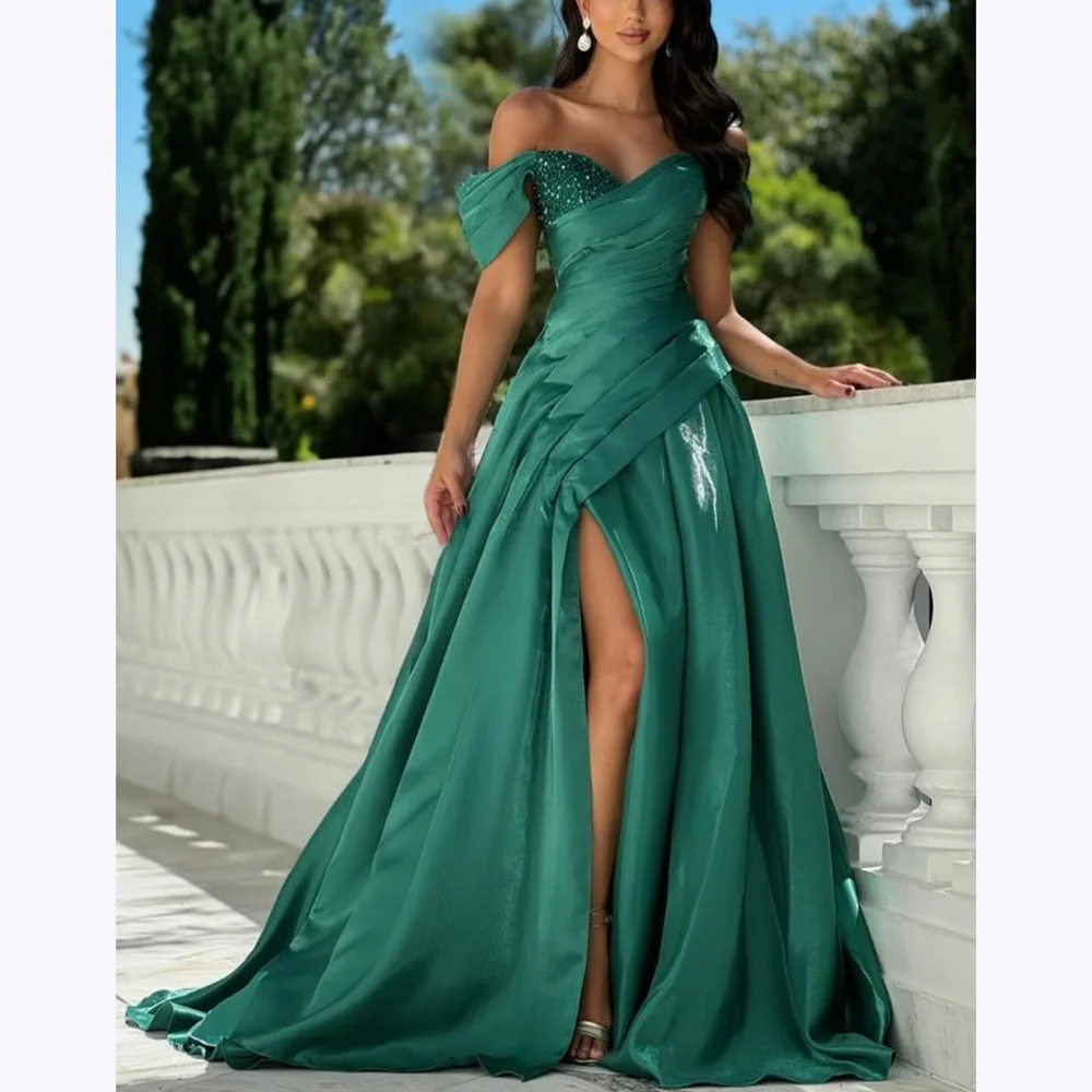 

Green Satin Prom Dresses Sequined Off The Shoulder Pleats A Line Evening Dress Side Slit Sleeveless Formal Gown Floor Length