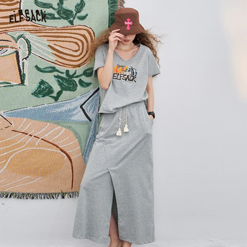 

ELFSACK 2025 Summer New Arrival Casual Grey Slit Skirt & V-Neck Graphic Design Print Tee 2 Piece Set Casual Outfit For Woman