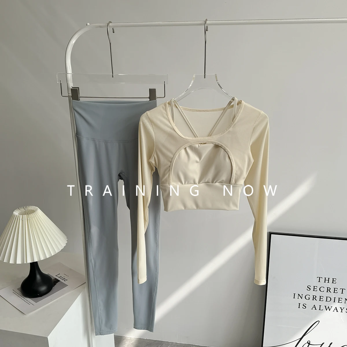 

Yoga suit set with chest pad for women's autumn new quick-drying running tight long-sleeved naked high-waist sports fitness