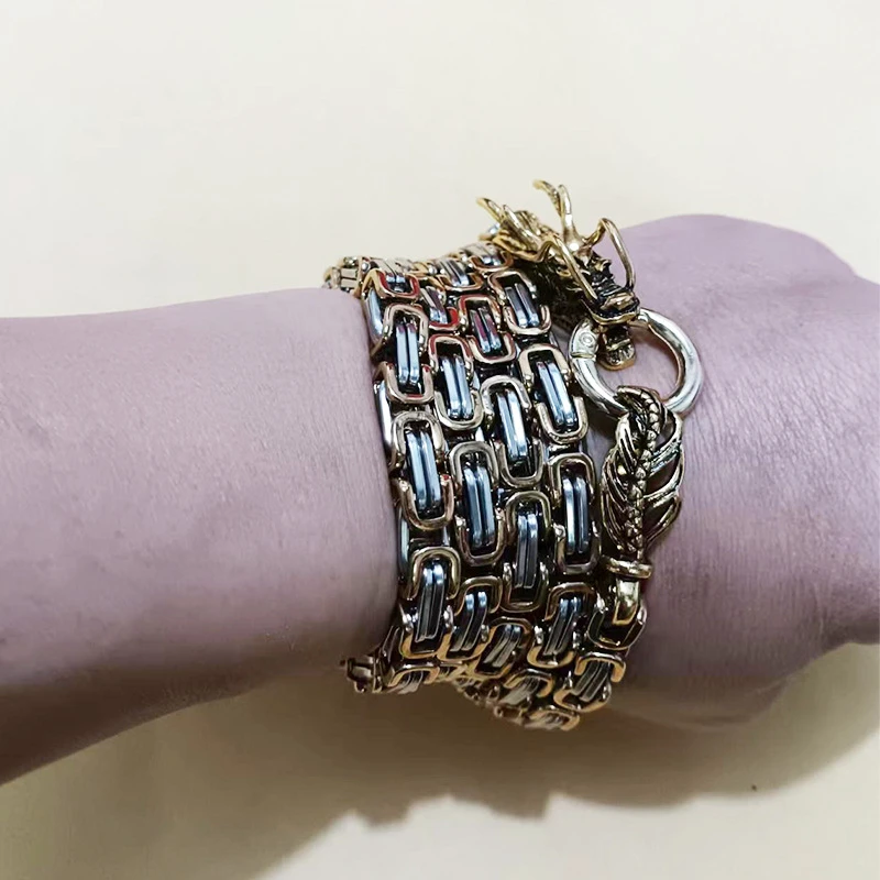 Bracciale da autodifesa in acciaio al titanio con motivo a drago, stile hip hop, per la protezione personale, adatto a uomini e donne.