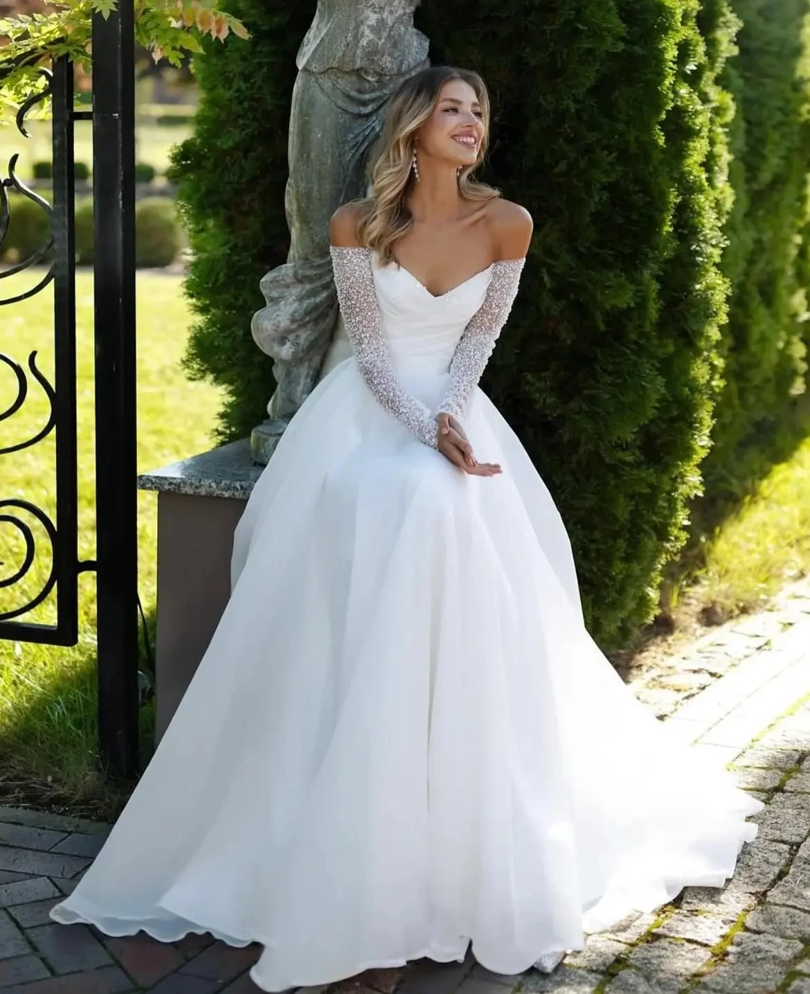 

Shiny Beaded Sequined Wedding Dresses 2026 Detachable Long Sleeves Strapless A Line Organza Bride Dress Bridal Gowns Sweep Train