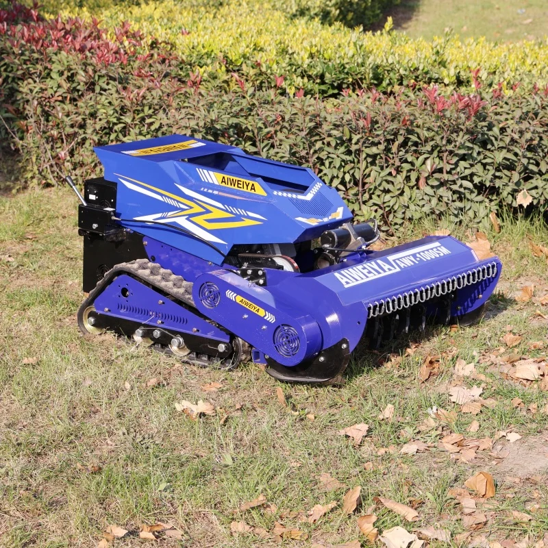

Настраиваемая гусеничная газонокосилка с дистанционным управлением 55 ° Гусеничная косилка-измельчитель для ровной и неровной местности, устойчивая к скольжению, для работы на склонах