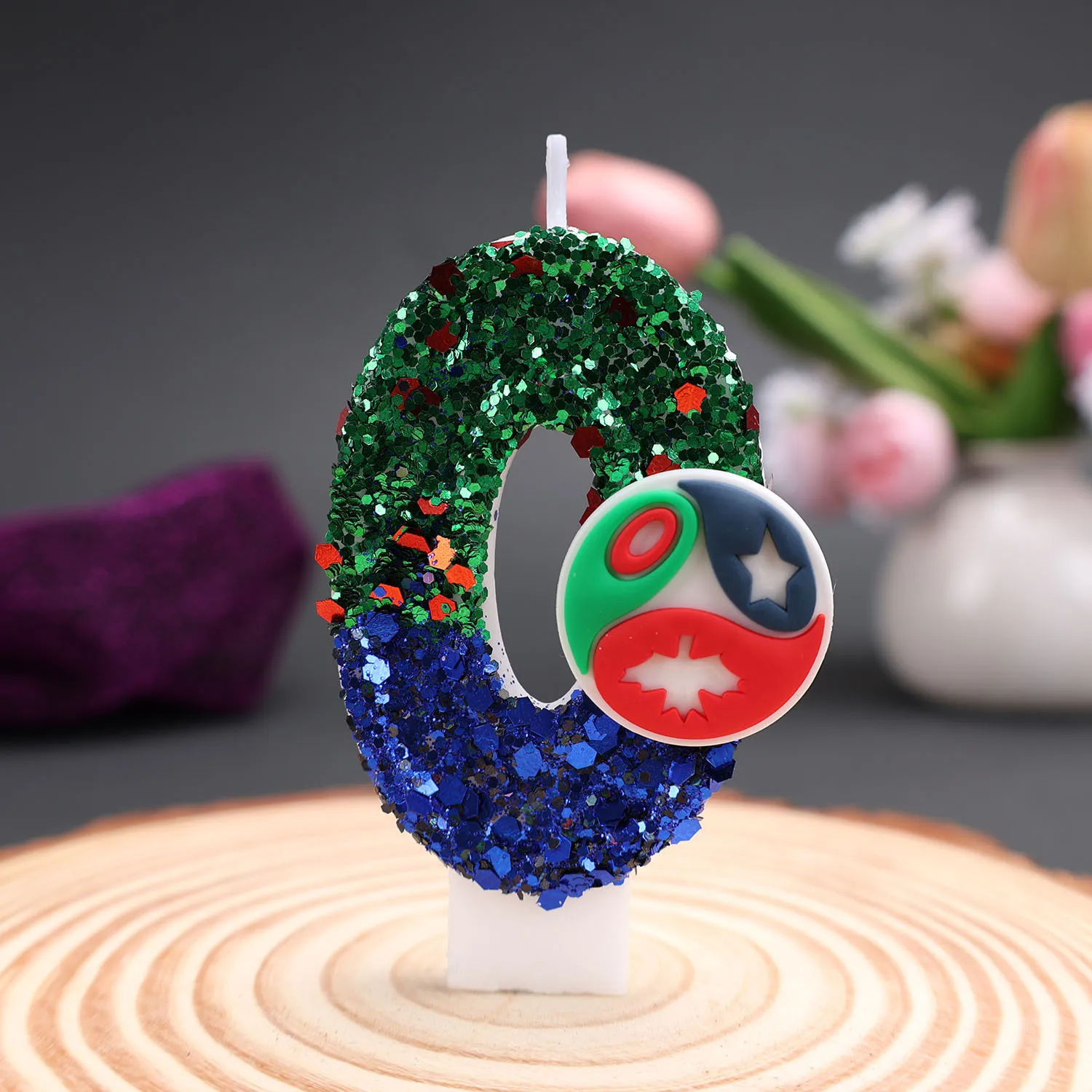 Green and blue digital candles with cartoon circular badges as decorations. Party gifts, birthday and anniversary candles.