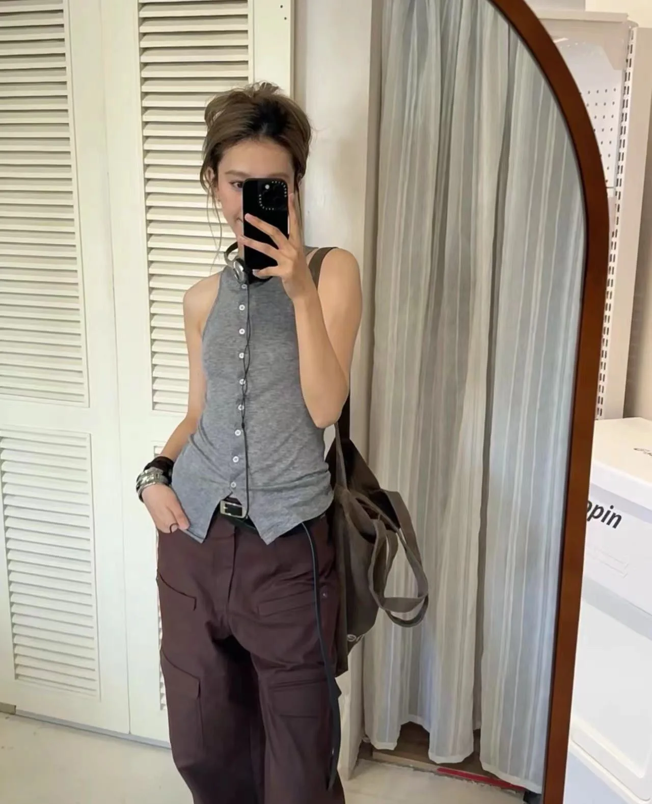 

Женский трикотажный топ на пуговицах