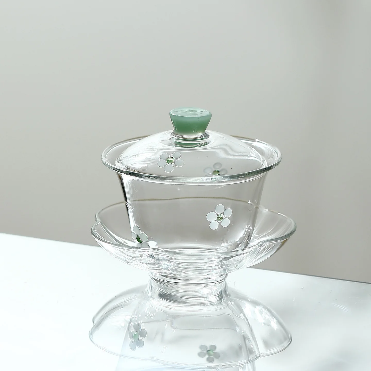 

Chinese high borosilicate glass cover bowl set transparent flower stream tea set with lid tea set tea bowl