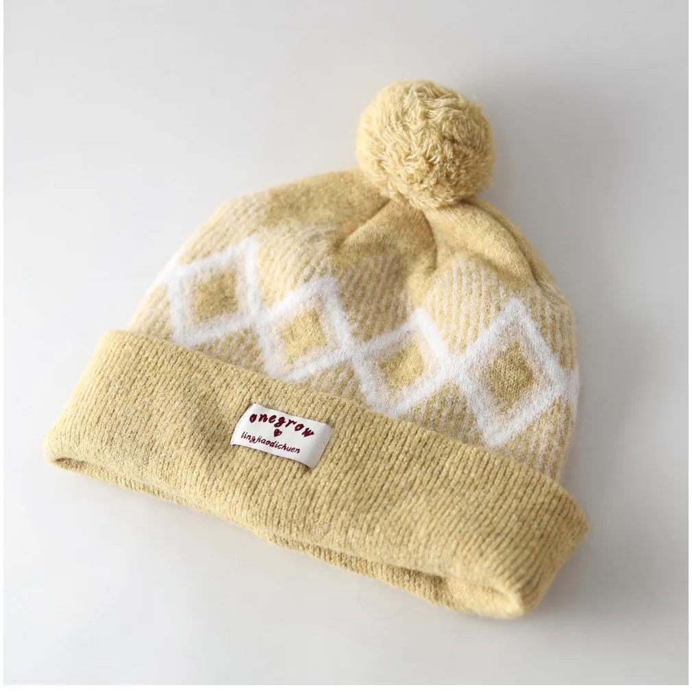 New arrival grids wool ball knitting hat for women windproof heattechcuteeasiest for matchcasual ear protection woolen hat