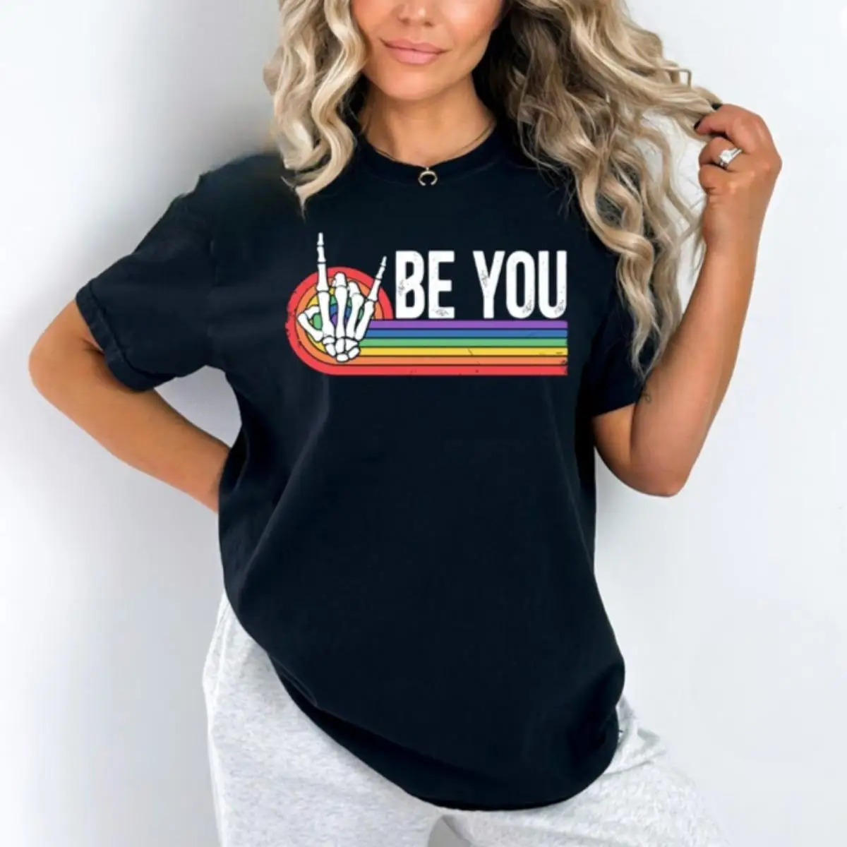 

Pride Month Top - "Be You" Rainbow Skeleton Hands Tee, LGBTQ+ Self-Love Cotton Shirt Graphic Tees