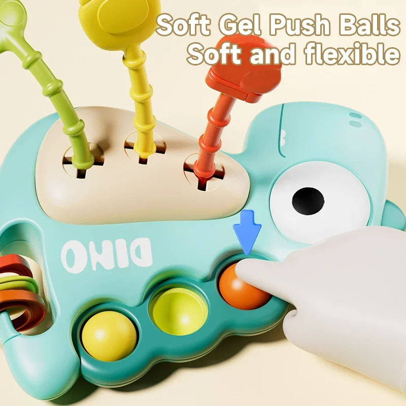 

Montessori Baby Cartoon Dinosaur Silicone Pull String Bruxism Toy Baby Fine Motor Skills Early Study Development Educational Toy