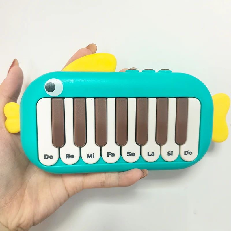 Instrumentos musicales para bebés Montessori, música electrónica multifuncional, teclado de Piano de bolsillo, juguete, juegos educativos de aprendizaje para niños